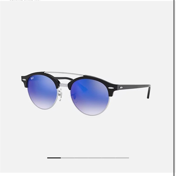 Ray-Ban Sunglasses with Vibrant Blue Lenses and Black Frame - Picture 1 of 4